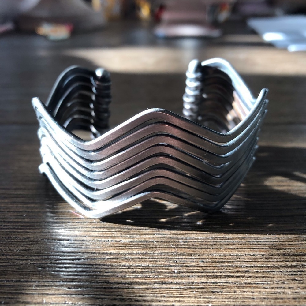 Sliver metal Herringbone cuff bracelet.